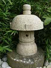 Small round-top granite lantern