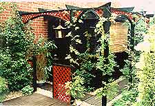 Black and red shed with Japanese-style features